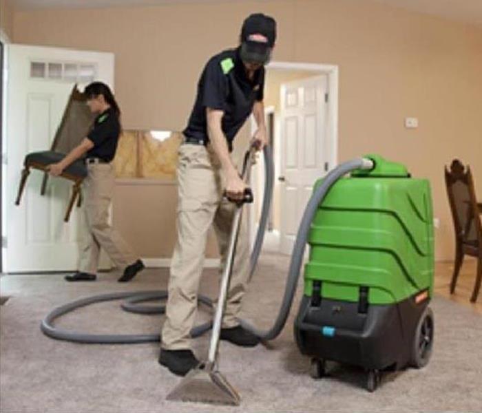 servpro crew cleaning carpet 